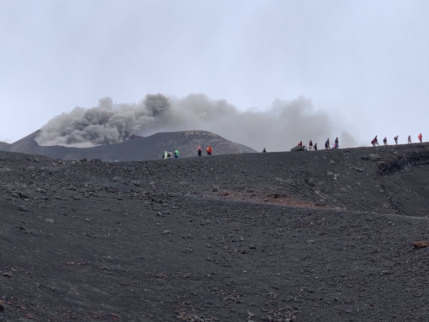 Mount Etna: Volcano Craters Hiking Tour - The descent through loose ash and snow