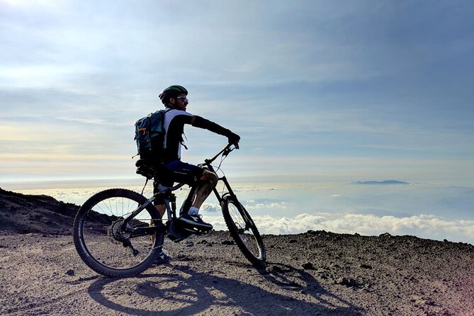 Mt. Etna Cycling to the Top small group - The descent, lava routes, and Valle del Bove