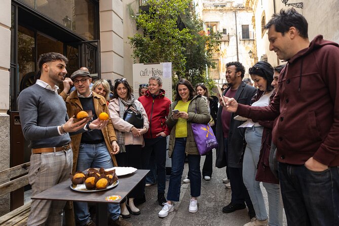 Palermo Street Food & Market Tour by Eating Europe - Two sfincioni at Forno Storico Pietro Marino