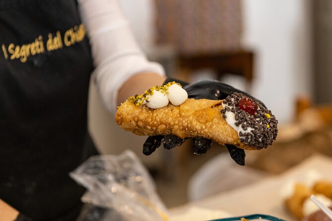 Palermo Street Food & Market Tour by Eating Europe - Fresh cannolo at I Segreti del Chiostro