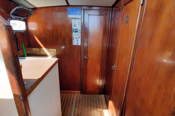 Private Boat Excursion Taormina - Giardini Naxos With Lunch - Fresh fish, local wine, and fruit on board