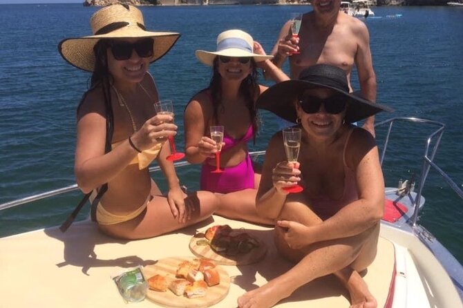 Private boat tour with prosecco and fresh fruit - Sea caves and the coast north of Syracuse