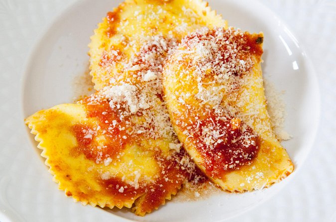 Share Your Pasta Love in Local's Home in Palermo - Sitting down to eat what you made