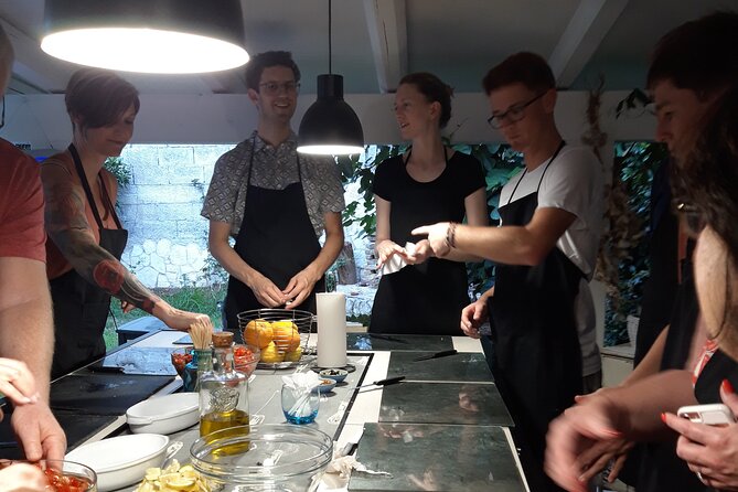 Sicilian Cuisine Cooking Class in Palermo - Preparing swordfish rolls and other main dishes