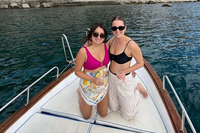 Sicilian wine tasting on the boat in Taormina - Spisone and the rocky northern bay