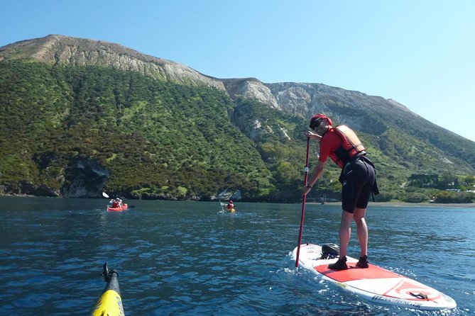 SUP into the sunset on Vulcano Island - The swim stop and the volcanic coast