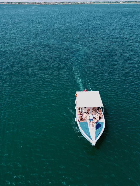 Syracuse: Boat tour Ortigia island,seacaves and Explanations - The 10-minute swim stop