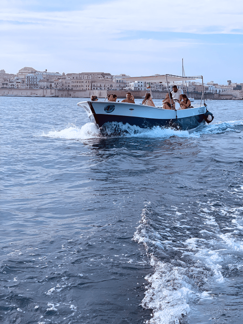 Syracuse: Ortigia and Sea Caves Excursion by Boat - Ortigia’s outer coast, Africa monument, and harbor views