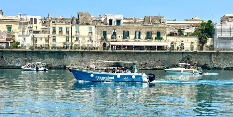 Syracuse: Ortigia Island and Sea Caves Boat Tour with Drinks - Ortigia’s waterfront from the boat