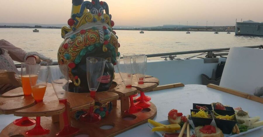 Syracuse: Ortigia Sunset Cruise with Aperitif - Leaving the small port and heading north