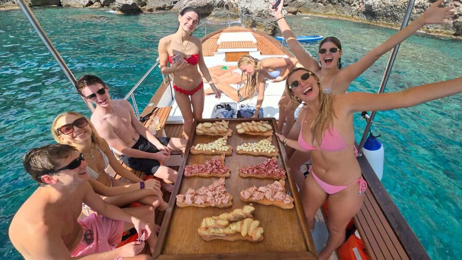 Taormina: Boat Tour with Sicilian Wine Tasting - Why the coast looks better from a boat
