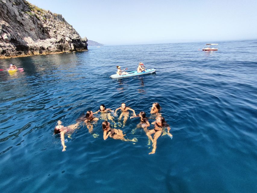Taormina: Coastal Highlights Cruise with Wine & Food Tasting - Etna wine, liqueurs, and food from the slopes