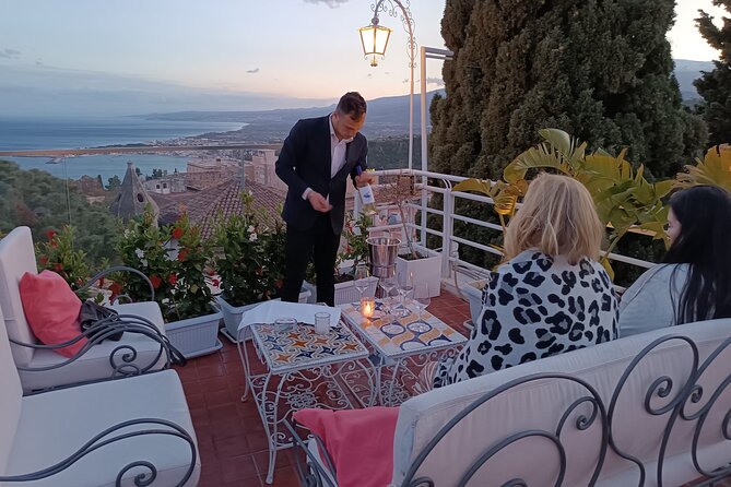Taormina premium food & wine tour at rooftops and upscale bars - Porta Messina: entering Corso Umberto with a first pour