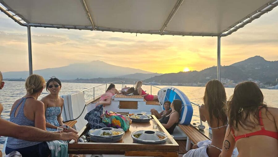 Taormina: Sunset Boat Tour with Aperitif - The return and possible beach drop-off