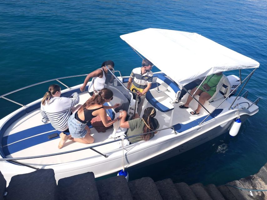 Taormina Sunset tour in search of dolphins with aperitif - The swim stop, prosecco, and seasonal fruit