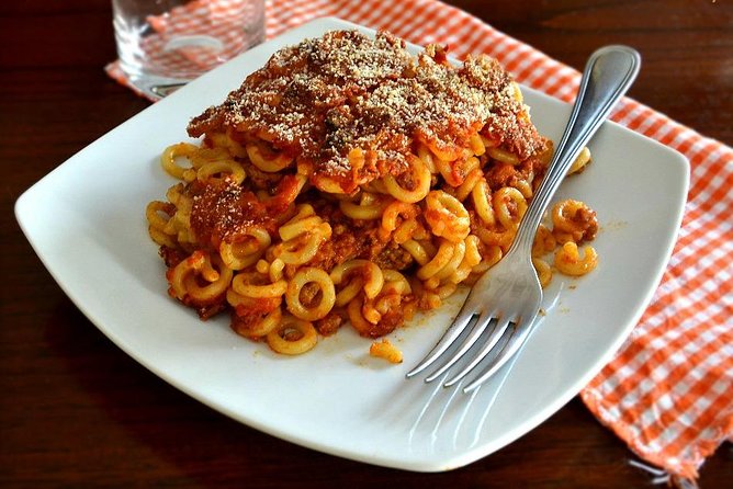 The Complete Street Food Walking Tour - History & Tasty Bites in Palermo - Via Maqueda and the arancina stop